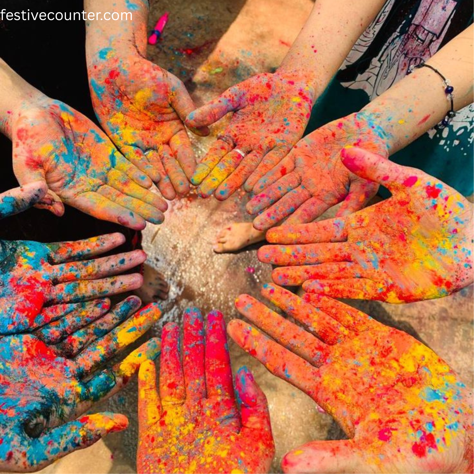 Hands Covered in Holi Colors – A Symbol of Joy and Togetherness Multiple hands covered in vibrant Holi powders, displaying bright colors like pink, blue, yellow, and green. The hands are extended outward, symbolizing joy, unity, and the festive spirit of the Holi celebration.