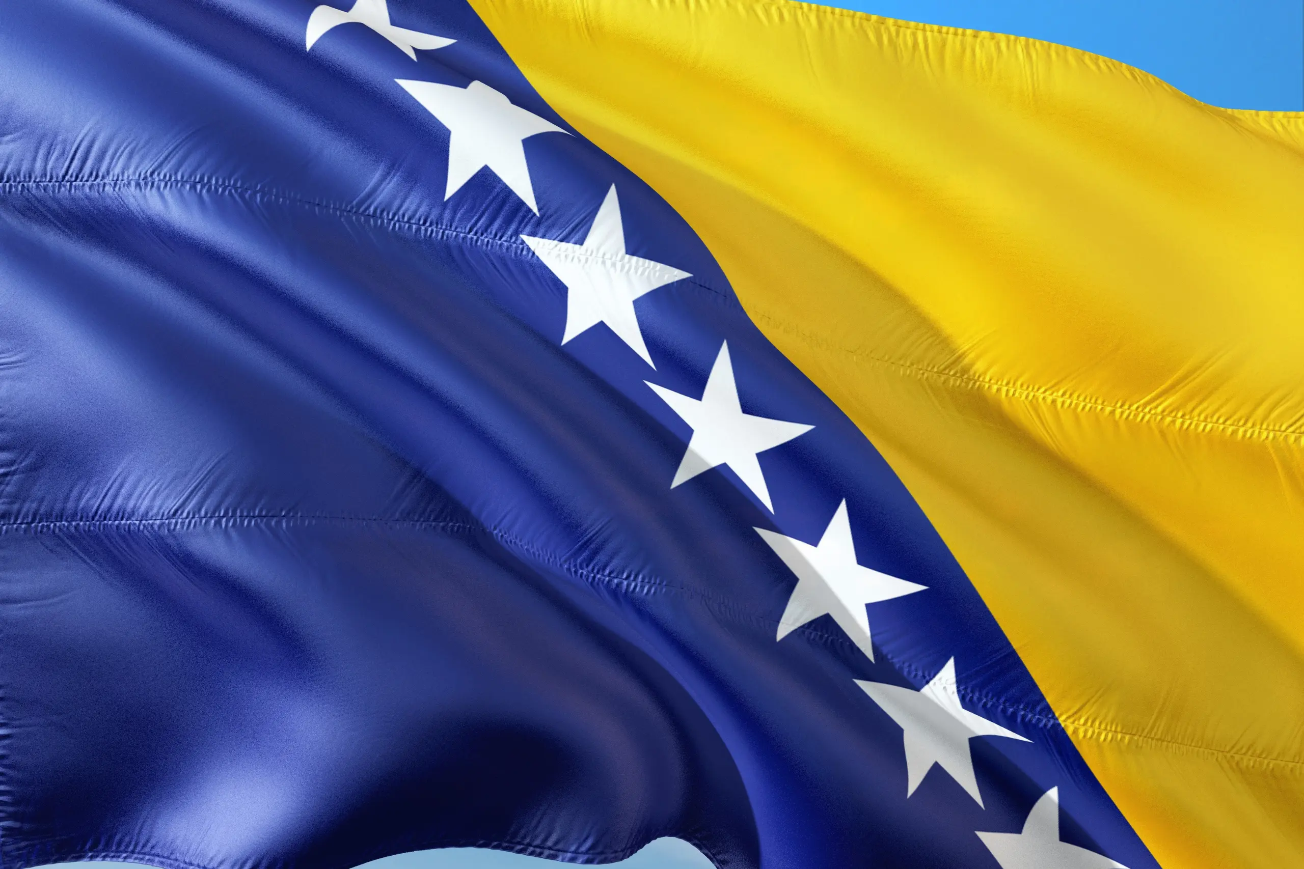 flag of Bosnia and Herzegovina blue, white and yellow showing the symbolic presence 