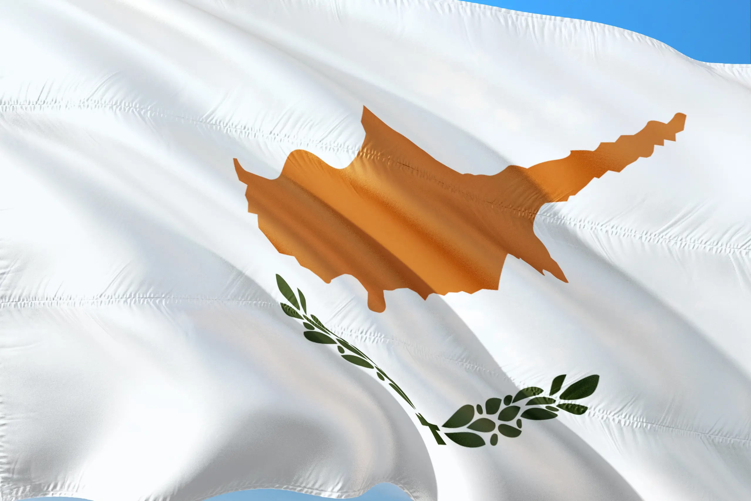 National flag of Cyprus with emblem on a white background