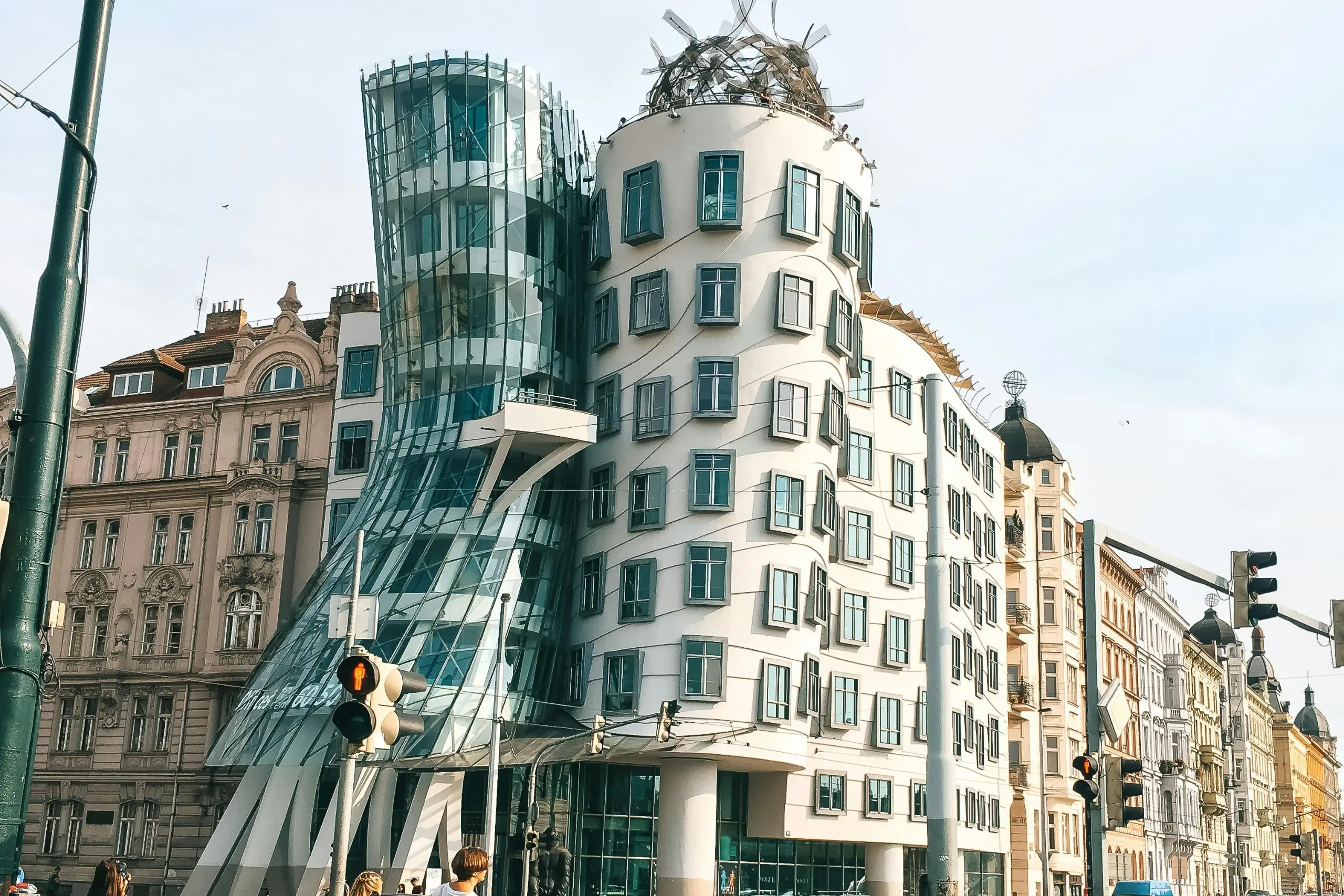 A unique Czech building with a wavy, uneven design that looks partially broken or distorted.