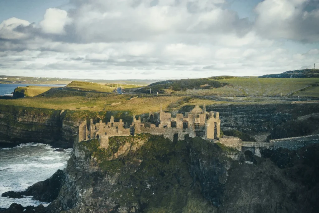 A festive Christmas tree featuring bright ornaments and a playful unicorn nestled among the branches
