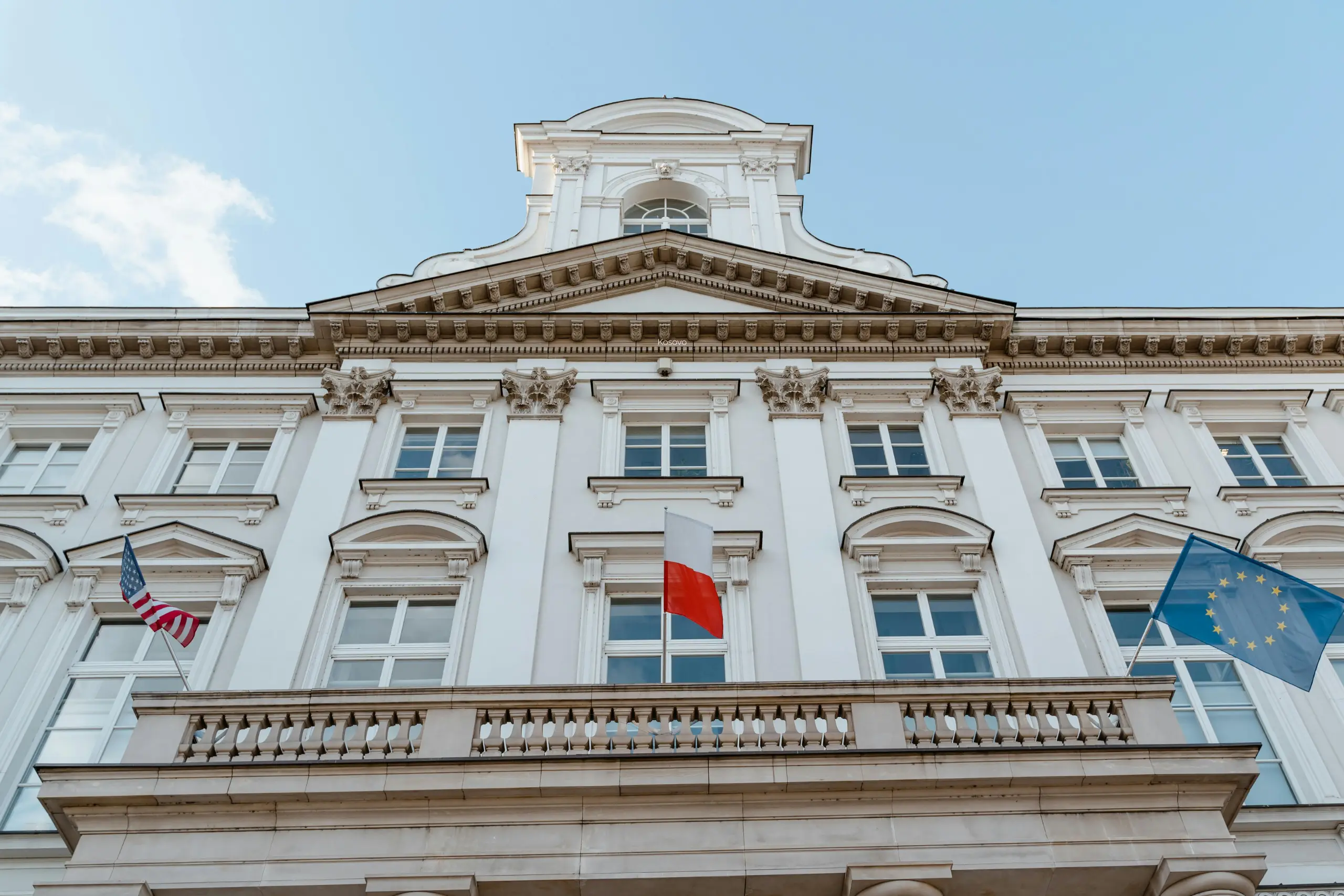 A festive Christmas tree featuring bright ornaments and a playful unicorn nestled among the branches