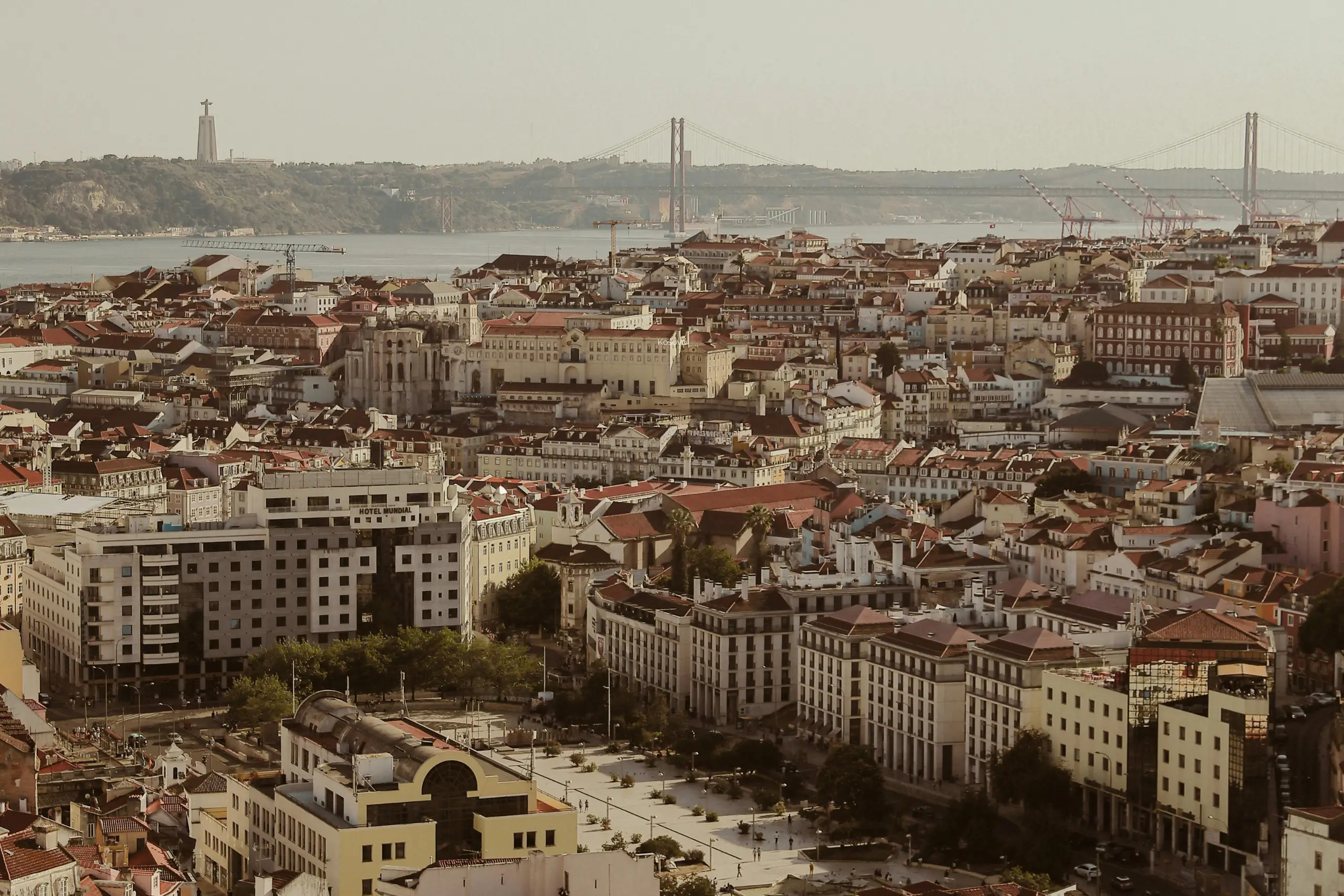 A festive Christmas tree featuring bright ornaments and a playful unicorn nestled among the branches