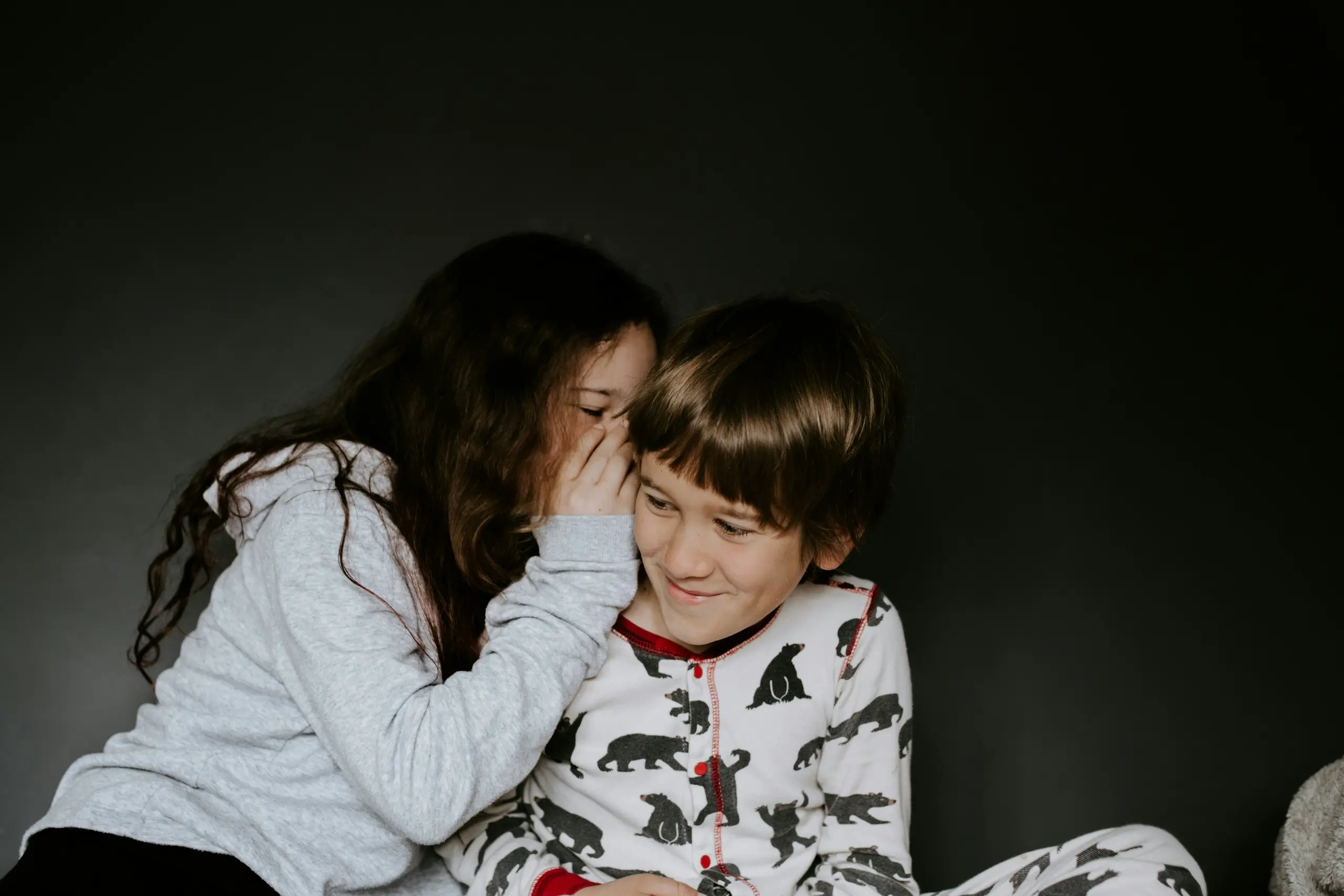 A group of people covered in yellow Color, engaged in an Holi activity involving Throwing colors on each other on the occasion of Holi