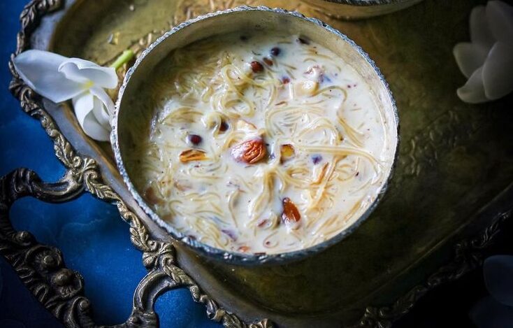 Sheer Khurma served in a bowl, topped with dates and nuts, the traditional sweet dish of Eid al-Fitr