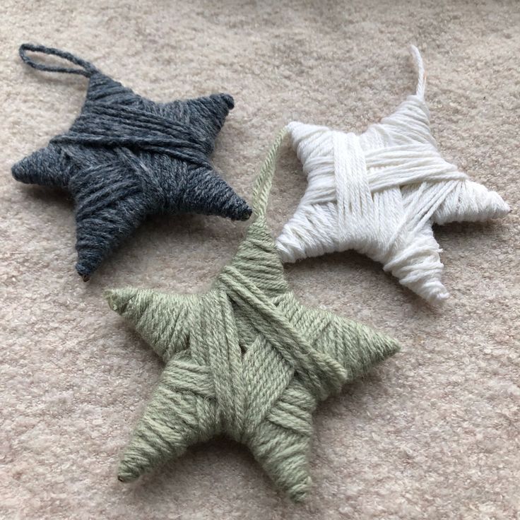 Handmade Christmas star ornament crafted with colorful yarn